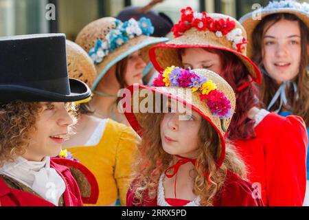 Bath, UK. 9th Sep, 2023. Jane Austen fans are pictured taking part in the world famous Grand Regency Costumed Promenade. The Promenade, part of the Jane Austen Festival is a procession through the streets of Bath and the participants who come from all over the world dress in 18th Century costume. Credit: Lynchpics/Alamy Live News Stock Photo