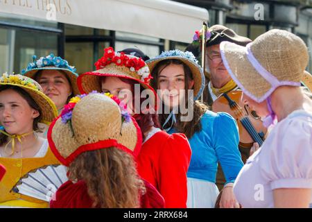 Bath, UK. 9th Sep, 2023. Jane Austen fans are pictured taking part in the world famous Grand Regency Costumed Promenade. The Promenade, part of the Jane Austen Festival is a procession through the streets of Bath and the participants who come from all over the world dress in 18th Century costume. Credit: Lynchpics/Alamy Live News Stock Photo