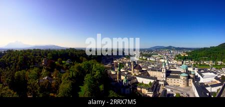 high resolution panoramic view at summer time to the city of Salzburg with river Salzach taken at the afternoon from elevated viepoint Stock Photo