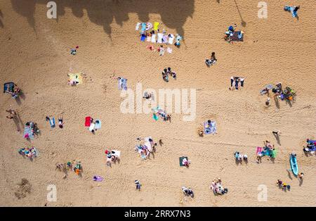 Edinburgh, Scotland, UK. 9th September 2023.  Aerial view of Portobello Beach outside Edinburgh which was busy with visitors making the most of unseasonable warm sunny weather in September. Temperatures rose to 26C in Edinburgh on Saturday. Iain Masterton/Alamy Live News Stock Photo