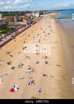 Edinburgh, Scotland, UK. 9th September 2023.  Aerial view of Portobello Beach outside Edinburgh which was busy with visitors making the most of unseasonable warm sunny weather in September. Temperatures rose to 26C in Edinburgh on Saturday. Iain Masterton/Alamy Live News Stock Photo