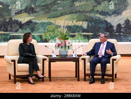 230829 -- BEIJING, Aug. 29, 2023 -- Chinese Premier Li Qiang meets with visiting U.S. Commerce Secretary Gina Raimondo at the Great Hall of the People in Beijing, capital of China, Aug. 29, 2023.  CHINA-BEIJING-LI QIANG-U.S. COMMERCE SECRETARY-MEETING CN RaoxAimin PUBLICATIONxNOTxINxCHN Stock Photo