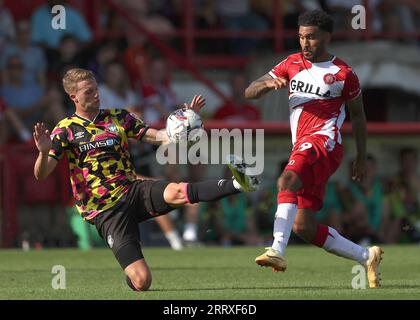 Stevenage's Jamie Reid (right) and Carlisle United's Finley Back battle ...