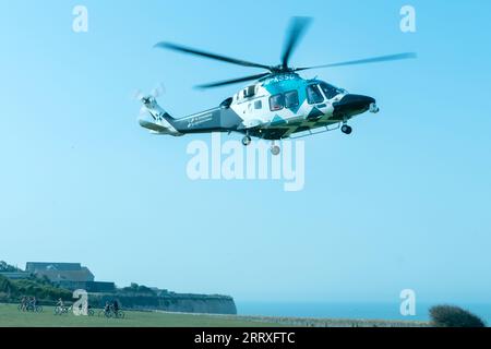 AW 169 helicopter of the Kent Surrey Sussex air Ambulance collecting Paramedic's in Birchington Kent Stock Photo