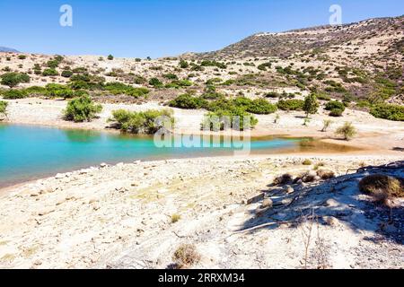 Bramian Lake in Ierapetra, Crete, Greece. The artificial Bramian Lake was built in 1986 to cover the cultivation needs of 30,000 acres of Ierapetra. T Stock Photo