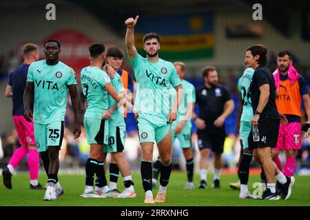 Stockport County's Ethan Pye (centre) celebrates after the Sky Bet League Two match at the Cherry Red Records Stadium, London. Picture date: Saturday September 9, 2023. Stock Photo