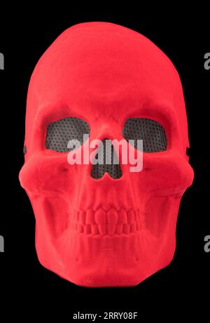 Red Velvet Skull Mask Isolated Against Black Background Stock Photo