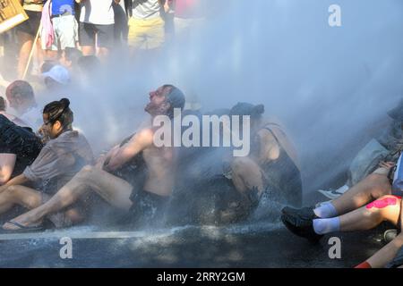 The Hague,The Netherlands, 9th september,2023. For the 8th time thousands of Extinction rebellion activists protested against fossil fuels subsidies by blocking the A12 motorway. Watercannons were used and police removed and arrested hundreds of people. Credit:Pmvfoto/Alamy Live News Stock Photo