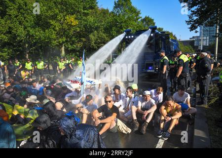 The Hague,The Netherlands, 9th september,2023. For the 8th time thousands of Extinction rebellion activists protested against fossil fuels subsidies by blocking the A12 motorway. Watercannons were used and police removed and arrested hundreds of people. Credit:Pmvfoto/Alamy Live News Stock Photo