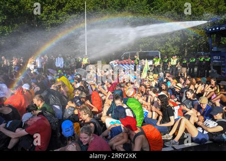 The Hague,The Netherlands, 9th september,2023. For the 8th time thousands of Extinction rebellion activists protested against fossil fuels subsidies by blocking the A12 motorway. Watercannons were used and police removed and arrested hundreds of people. Credit:Pmvfoto/Alamy Live News Stock Photo