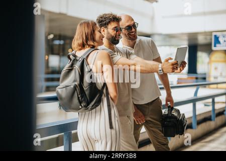 A focused business group discussing work and collaborating outdoors in the city. Demonstrating innovation, leadership, and teamwork. Stock Photo