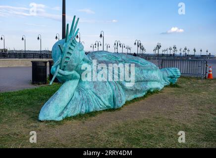 reclining Statue of Liberty on the waterfront in Liberty State Park, New Jersey Stock Photo