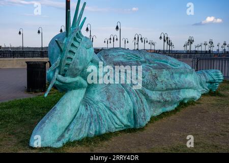 reclining Statue of Liberty on the waterfront in Liberty State Park, New Jersey Stock Photo