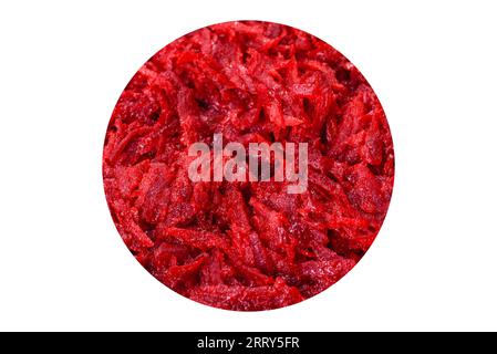 Fresh raw grated beets with salt and spices on a neutral background. Cooking ingredient Stock Photo