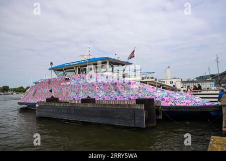 City ferry in Amsterdam over the IJ Water. These ferries runned bij GVB and are for pedestrians and cyclist. Access is free of charge Stock Photo