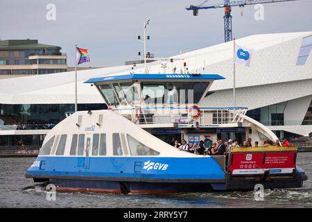 City ferry in Amsterdam over the IJ Water. These ferries runned bij GVB and are for pedestrians and cyclist. Access is free of charge Stock Photo