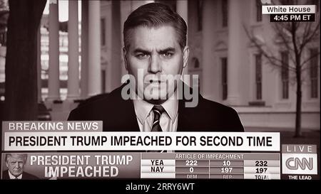 A TV screenshot ofCNN reporter Jim Acosta reporting on former U.S. President Donald Trump's second impeachment on Jan. 13, 2021. Stock Photo