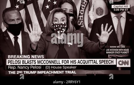 A CNN screenshot of House Speaker Nancy Pelosi criticizing Senator Mitch McDonnell's acquittal speech at the second impeachment of Donald Trump. Stock Photo