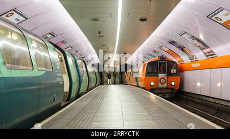 SPT subway train arriving at Glasgow Kinning Park Subway station on the Glasgow underground / subway Stock Photo