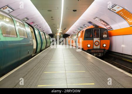 SPT subway train arriving at Glasgow Kinning Park Subway station on the Glasgow underground / subway Stock Photo