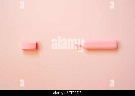 Highlighter pen isolated on pink background. top view, copy space Stock Photo