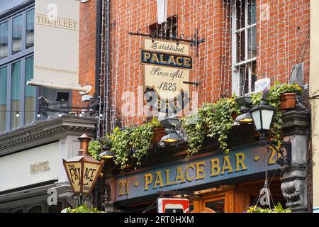 Outdoor signs on building wall for bar and hotel in Temple Bar area of Dublin, Ireland Stock Photo