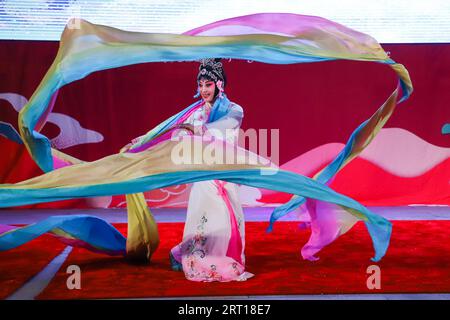 Addis Ababa, Ethiopia. 8th Sep, 2023. An artist of the Zhejiang Wu Opera troupe performs Wu Opera 'The Celestial Maiden Scattering Flowers' at the headquarters of the African Union in Addis Ababa, Ethiopia, Sept. 8, 2023. Chinese cultural performances were held at the headquarters of the African Union (AU) in the Ethiopian capital of Addis Ababa on Friday to mark the joint celebration of the 60th anniversary of the founding of the then Organization of African Unity (OAU), now the AU, and the AU Day. Credit: Michael Tewelde/Xinhua/Alamy Live News Stock Photo