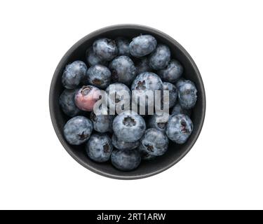 Fresh organic blueberries ina black ceramic bowl topv view isolated on white background Stock Photo