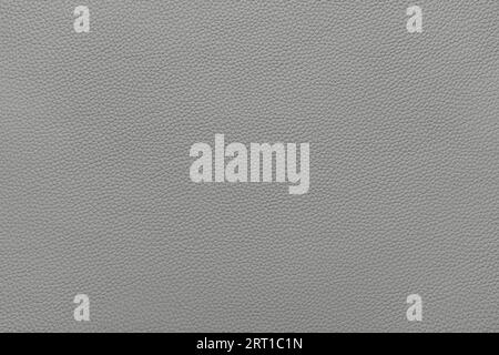 Genuine light gray leather, eco friendly leatherette texture background. Material for upholstery and interior design, sport items and clothes. Wallpap Stock Photo
