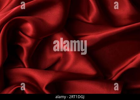 Red silk fabric, close up romantic texture, Valentine's day background Stock Photo