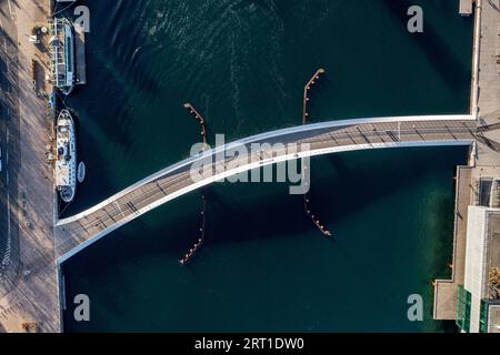 Copenhagen, Denmark, January 14, 2022: Aerial drone view of the new modern pedestrian and cycling bridge Lille Langebro Stock Photo