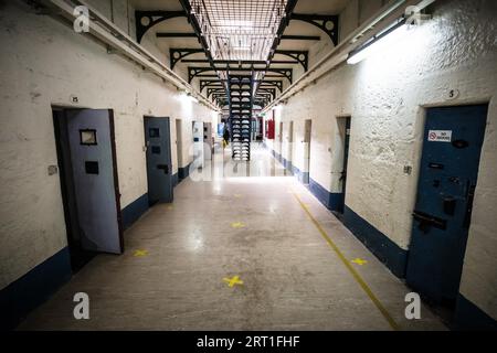 BEECHWORTH, AUSTRALIA, DECEMBER 30, 2021: Historic Beechworth Gaol and its interiors of hallways of jail cells on a hot summer's day in Victoria Stock Photo