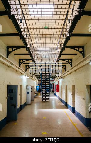 BEECHWORTH, AUSTRALIA, DECEMBER 30, 2021: Historic Beechworth Gaol and its interiors of hallways of jail cells on a hot summer's day in Victoria Stock Photo