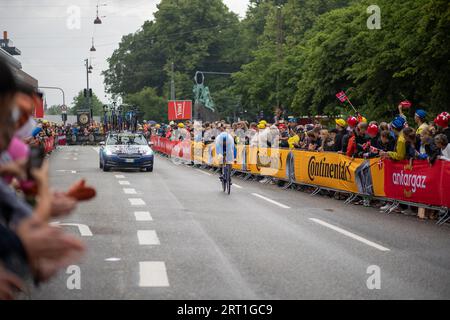 Copenhagen, Denmark, July 01, 2022: A participant and spectators at the Tour de France in the city centre Stock Photo