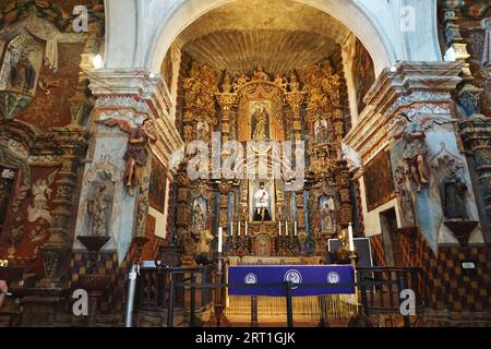 View of the altar inside San Xavier del Bac Mission on the San Xavier Reservation, part of the Tohono O’odham nation, near Tucson, Arizona Stock Photo