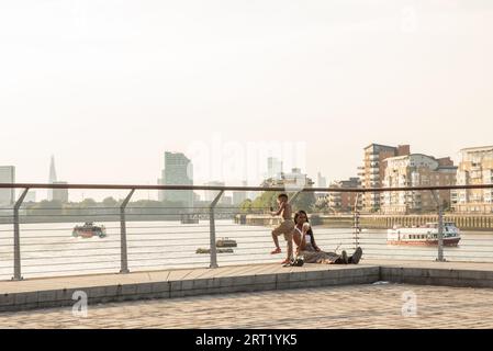 London, UK. . 9th September 2023. Woman and young boy resting in the sun on the hottest day in London. Cristina Massei/Alamy Live News Stock Photo