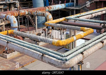 Thermal insulation pipe and mechanical equipment in the factory, closeup of photo Stock Photo