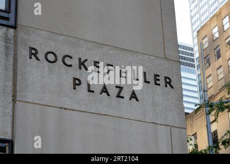 New York, United States, September 21, 2019: Rockefeller Plaza sign at the side of a Rockefeller building Stock Photo