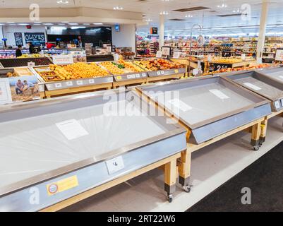Melbourne, Australia, July 8, 2020: As Melbourne shuts down for a second time, empty fruit and vegetable shelves become common in Australian Stock Photo
