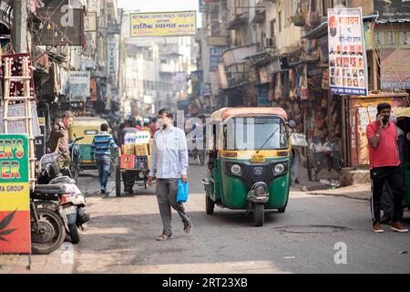 Delhi, India, December 04, 2019: People on busy street at Main Bazaar in Paharganj district Stock Photo