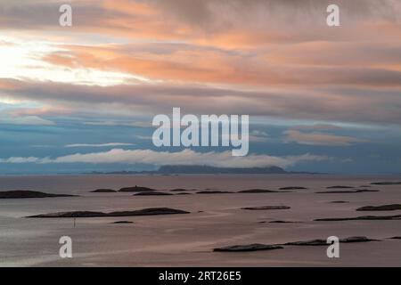 Skerries off the isle of Lovund (Norway) on a rainy day's evening Stock Photo