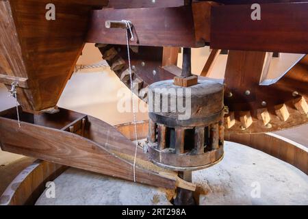 The original, wooden mechanism of an old Greek windmill, grain mill Stock Photo