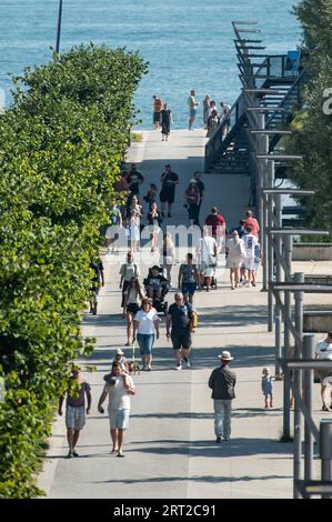 Konstanz, Germany. 10th Sep, 2023. People walk along the promenade in the sunshine on the last day of the summer vacations in Baden-Württemberg. Credit: Silas Stein/dpa/Alamy Live News Stock Photo