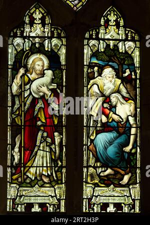 Good Shepherd and Good Samaritan stained glass in St. James Church, Dadlington, Leicestershire, England, UK Stock Photo