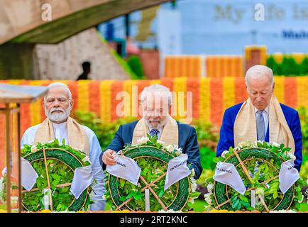 New Delhi, India. 10th Sep, 2023. Indian Prime Minister Narendra Modi, left, leads the G20 leaders in paying respects at the at the Samadhi of Mahatma Gandhi at Rajghat, September 10, 2023 in New Delhi, India. Standing from left: Indian Prime Minister Narendra Modi, Brazilian President Lula da Silva, and U.S. President Joe Biden. Credit: Ricardo Stuckert/President Brazil/Alamy Live News Stock Photo