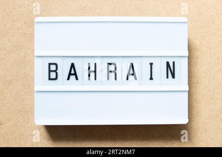 Lightbox with word bahrain on wood background Stock Photo