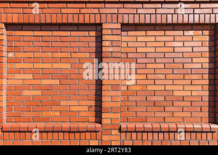 New brick wall with two square shallow niches Stock Photo