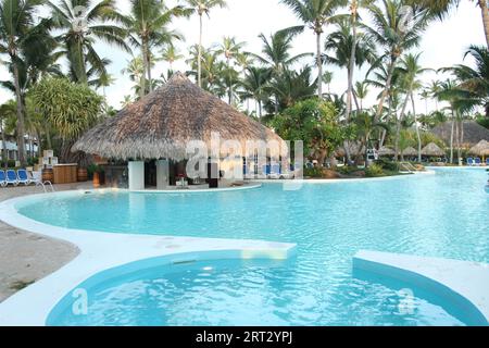 Pool bar with empty swimming pool at Melia Caribe Beach Resort in Punta Cana, Caribbean, Dominican Republic, 2023 Stock Photo