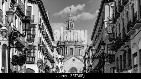 Calle Alfonso I is a main street in the historic center of Zaragoza. It links between El Coso with the Plaza del Pilar. Stock Photo