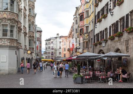 Innsbruck, Austria, June 8, 2018: City centre with historical buildings, cafes and people Stock Photo